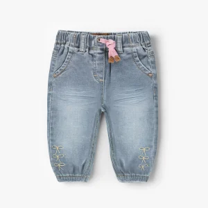Jean bleu avec broderies de boucles, bébé
