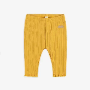 Legging long moutarde en maille irrégulière, naissance